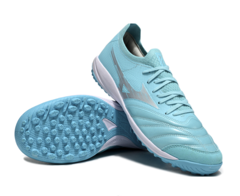 22. Mizuno TF – Turquesa/Plata
